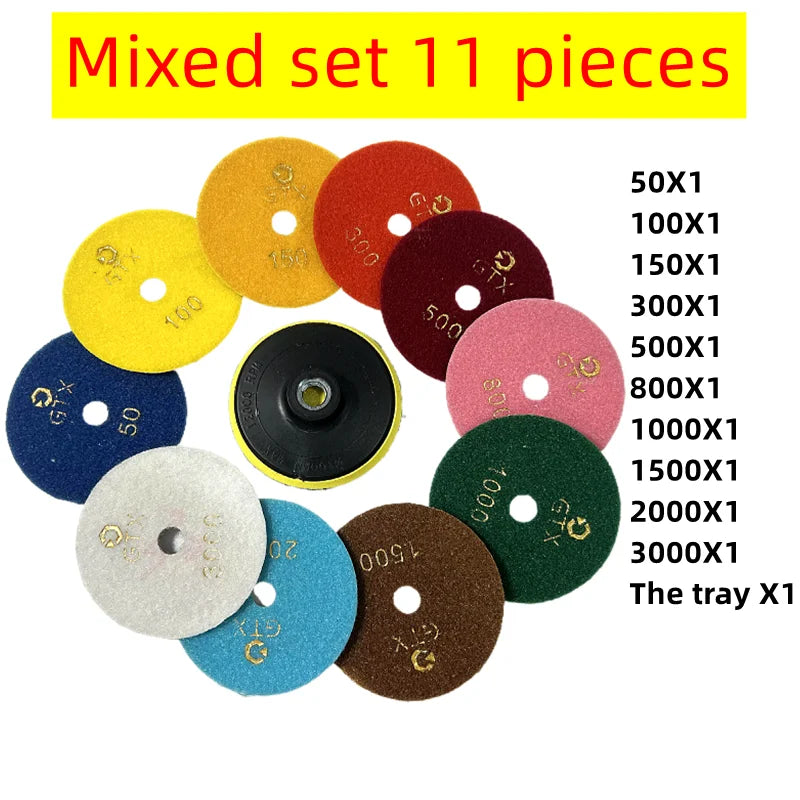 Un set mixto de 11 almohadillas para pulir diamantes en varios colores y granos, de 50 a 3000.