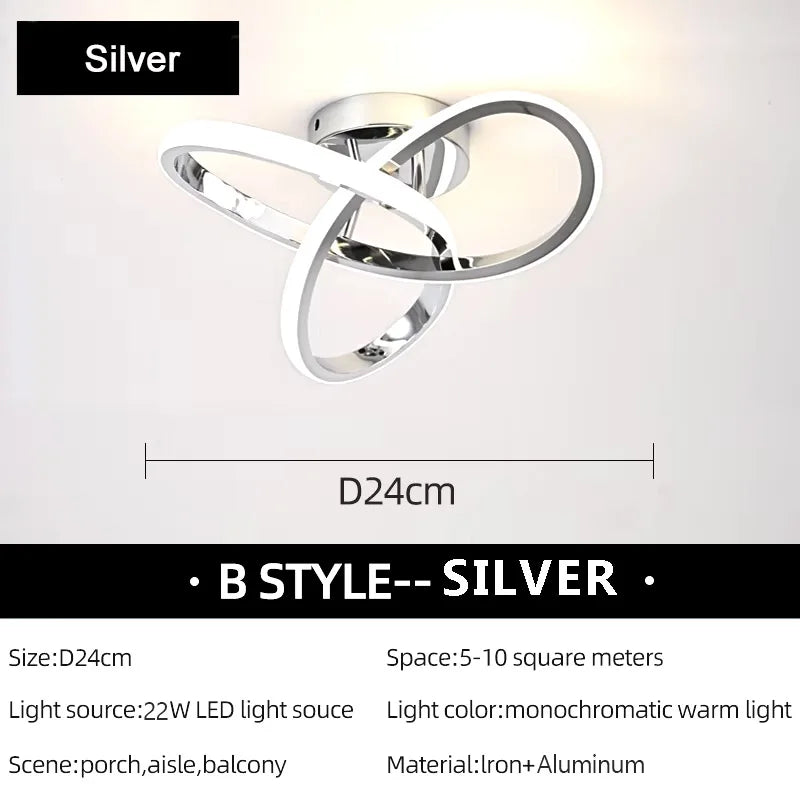 Silver B-style modern LED ceiling light fixture with an oval design.
