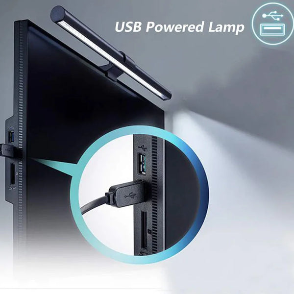 An adjustable USB powered lamp illuminates a computer or desk area.