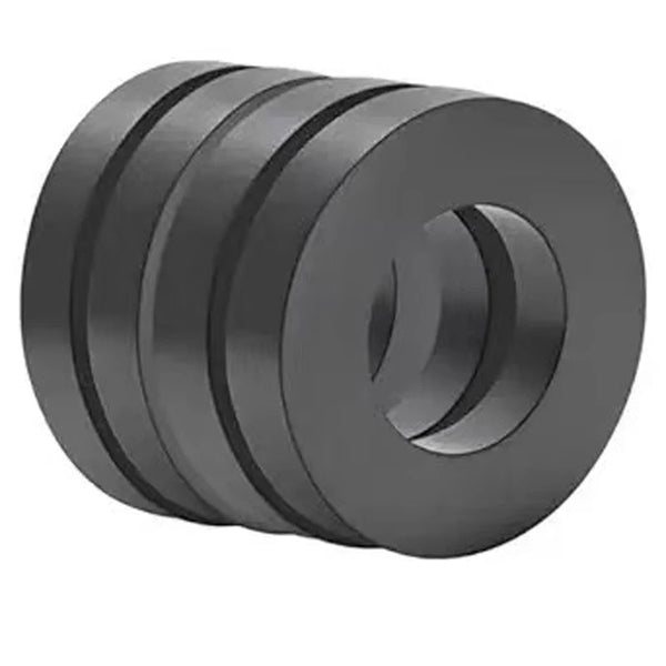 A set of industrial ceramic ring magnets, dark gray in color.