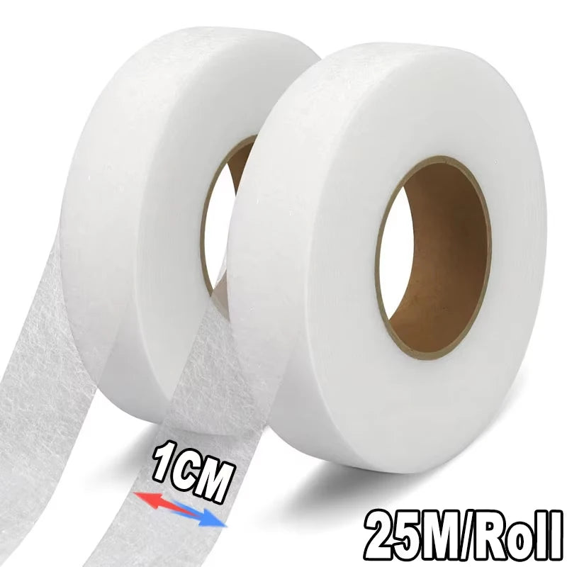 Roll of white iron-on hemming tape with a 1cm measurement mark and 25 meters per roll.