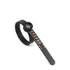 A black precision ring sizer with a magnifying feature and numbered markings.