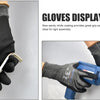 Black heavy-duty anti-cut work gloves being used to operate a power tool.