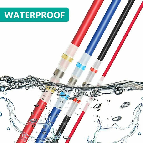 A close-up of several waterproof solder seal wire connectors in red, blue, and black colors being submerged in water.