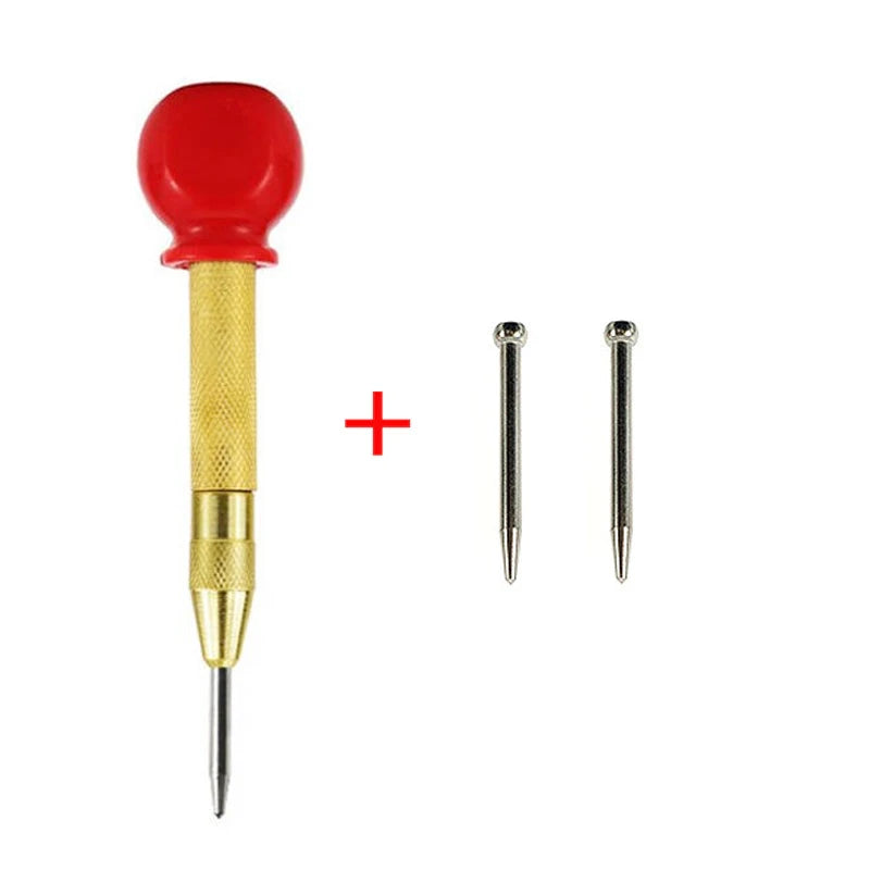 A red automatic centre punch tool with a brass shaft and a pointed tip.