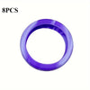 Eight purple protective luggage wheels shown in a circular view.