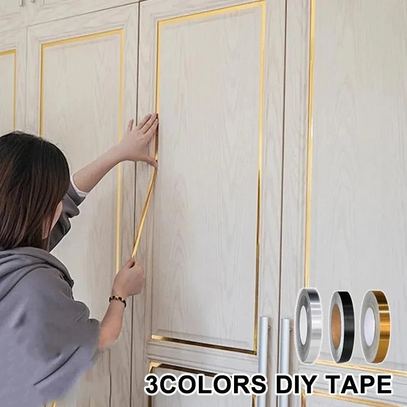 A person is applying 3 colors DIY tape to the gap between light wood panels.