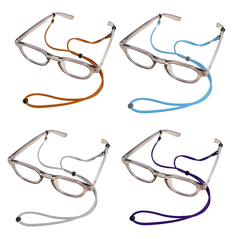 Quatre cordons de lunettes ajustables argentés, orange, bleu et violet, affichés sur fond blanc.
