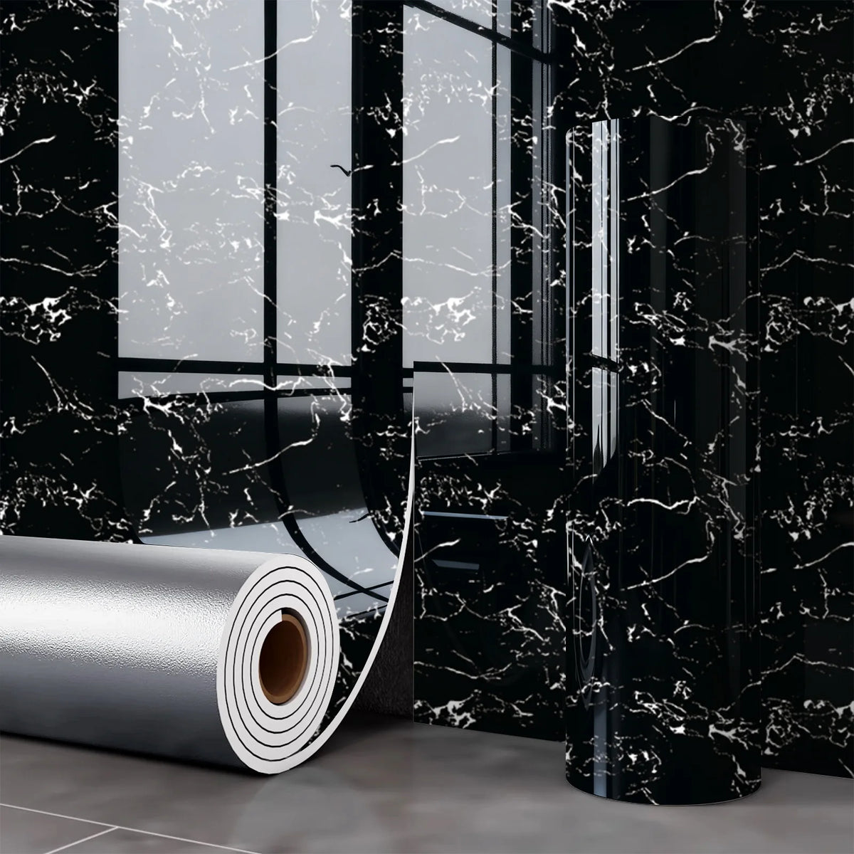 Roll of silver marble wall decals against a black marble background.