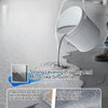 A white paint is being poured onto a concrete floor, demonstrating strong leveling and mirror-like smoothness.