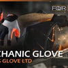 A close-up of a mechanic glove being used, showing the hand and forearm in an industrial setting.