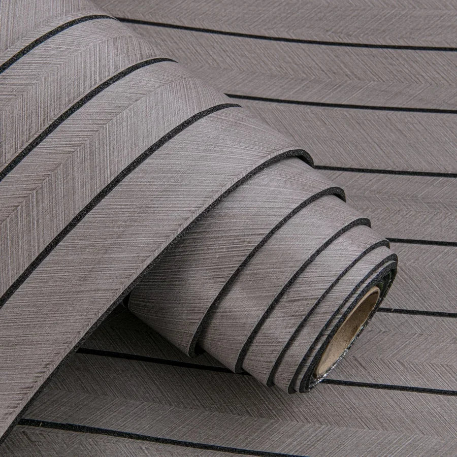 Roll of gray 3D self-adhesive wall decor grille wallpaper showing a textured surface.