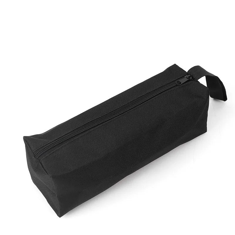 Black Oxford cloth hand-held storage bag with a zippered top and strap.