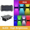 Set Solarwandleuchten mit 6 LEDs in verschiedenen Farben wie Lila, Blau, Grün und Rot.