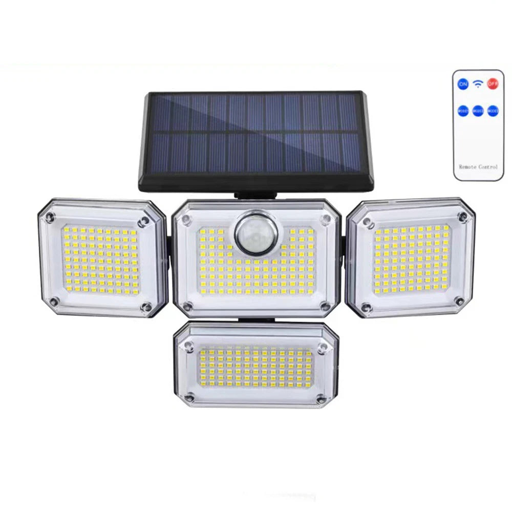 Kit de luz inundadora solar con cuatro focos LED y panel solar, con control remoto visible.