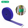 Blue natural nylon garden twine plant ties rolled on a spool and shown as a strip.