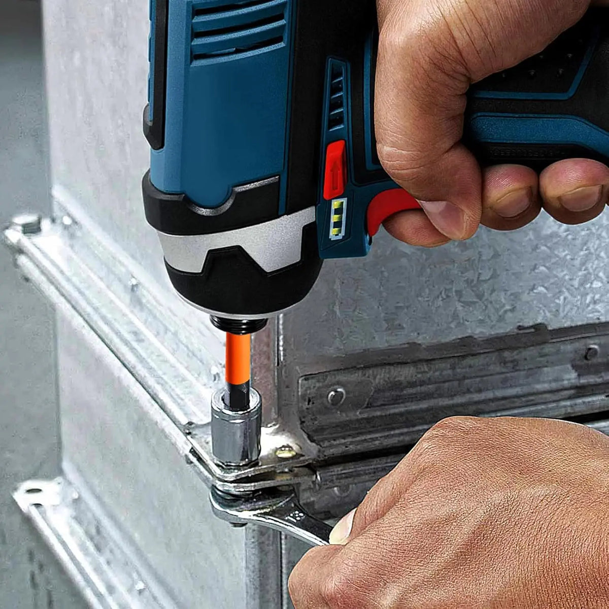 A hand is using a magnetic impact drill bit on a metal object with a blue and black tool.