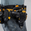 A black tool belt with yellow accents is worn over denim jeans, featuring a specialized tool holder.