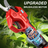 Red M-WALK brushless electric pruning shears with a visible motor and blades in a green outdoor setting.