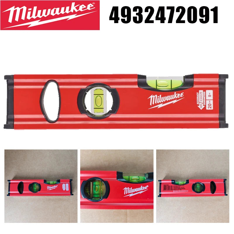 A red Milwaukee torpedo level set with a black casing and green illumination.