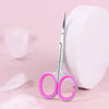 A pair of pink-handled professional stainless steel nail cuticle trimmers resting on a pink background next to a white object