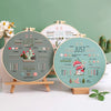 A set of embroidery hoops displaying various stitch patterns and designs for practice.