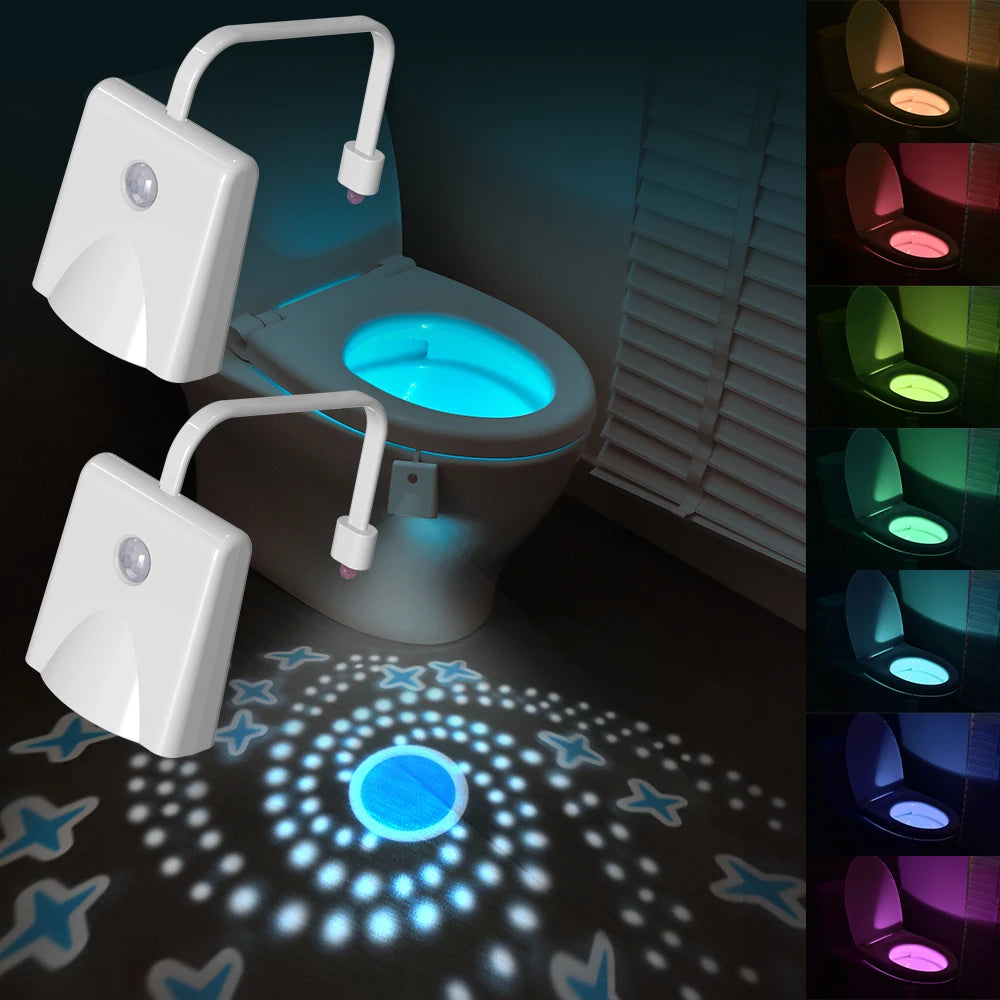 A motion sensor night light for the bathroom is shown illuminating a toilet and surrounding area.