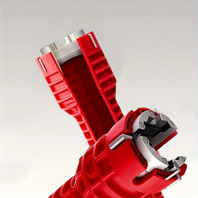 A close-up view of a red heavy-duty adjustable faucet wrench set with silver metal components.
