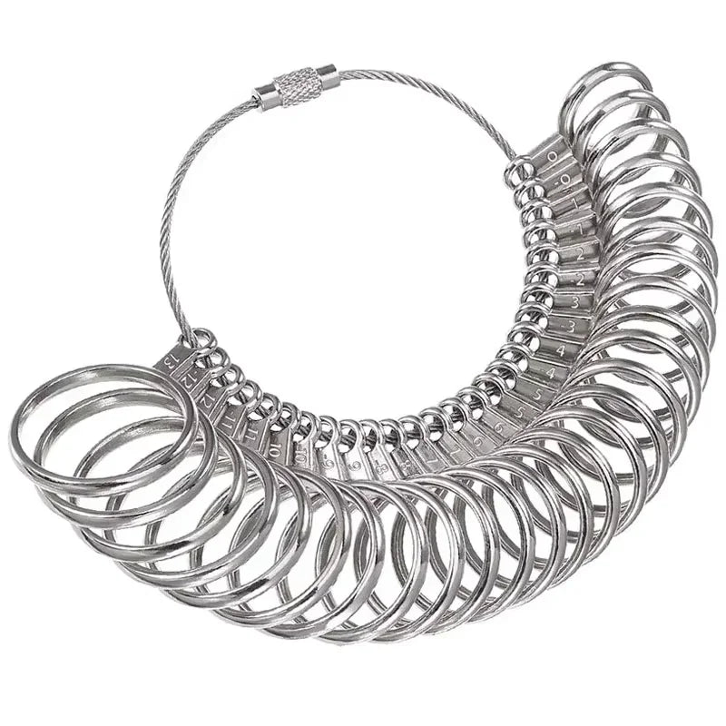 Precision stainless steel ring sizer gauge kit with a coiled wire and multiple rings.