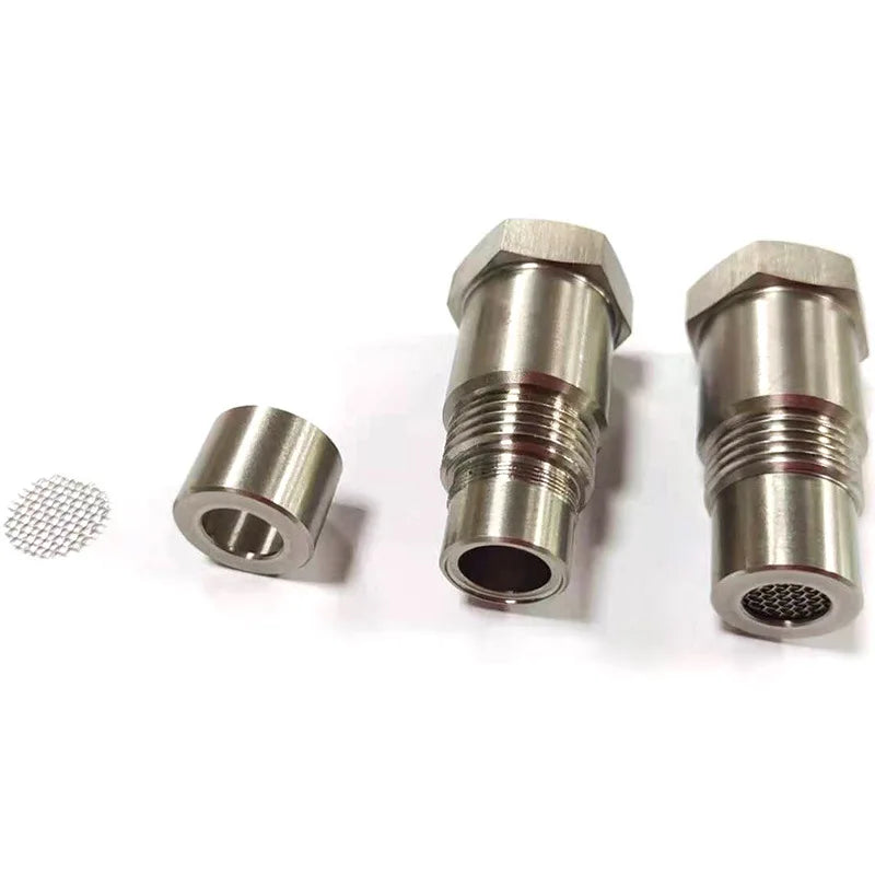 Three precision oxygen sensor adapters for automotive, showing different sizes and thread types.