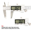 A silver digital vernier caliper displaying 0.02 mm measurement on a white background.