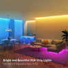 Bright and beautiful RGB strip lights illuminating a modern living room interior.