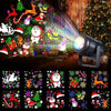A festive scene showing various Christmas decorations and lights illuminated by a projector.