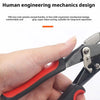 A hand is holding heavy duty aviation tin snips shears with a black and red handle.