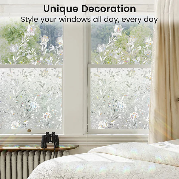 Decorative window privacy film applied to a window, featuring floral patterns.