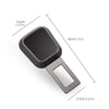 A black universal seatbelt clip extender with dimensions 3.6cm by 8cm.