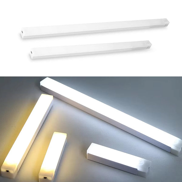 A white linear LED cabinet light fixture shown in multiple angles against a gray background.