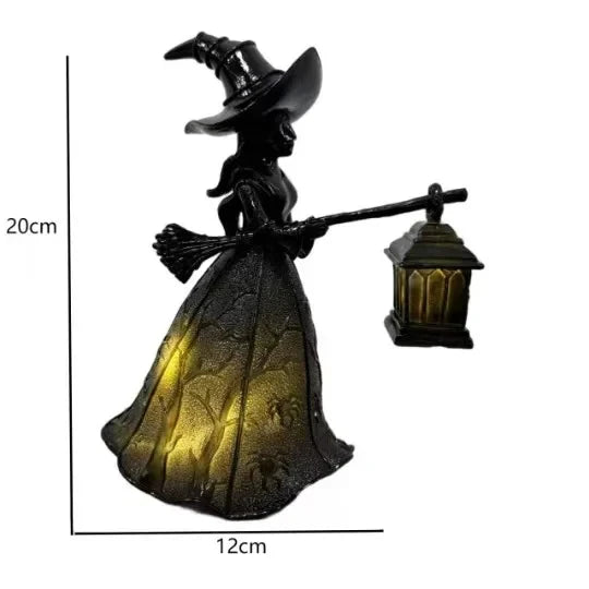 Linterna gótica negra para noche con figura de bruja y pantalla de vidrio brillante.