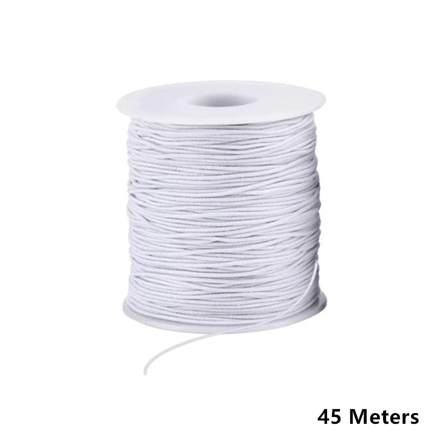 A spool of 1mm stretchy rainbow elastic cord for jewelry making, white in color.