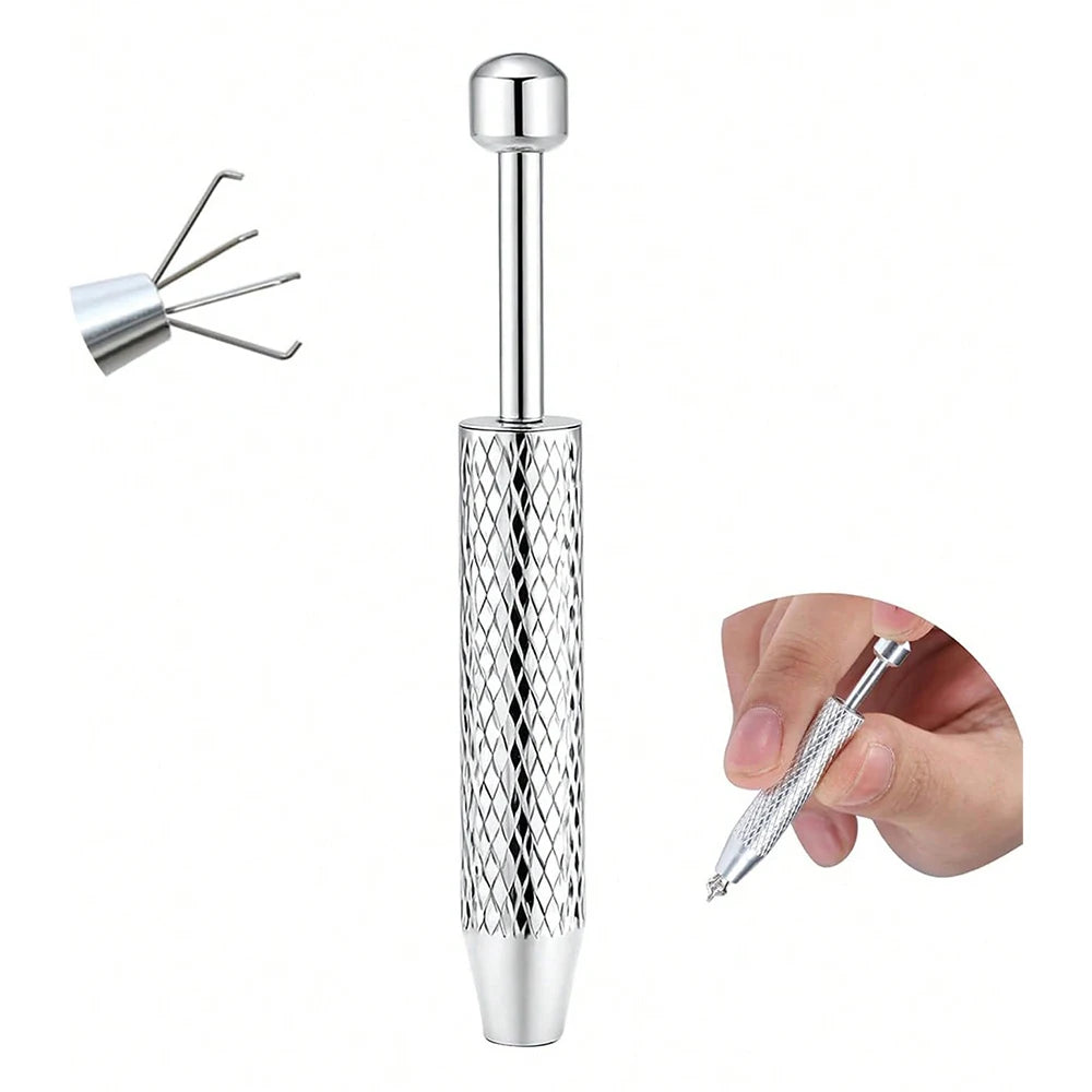 Stainless steel piercing ball grabber kit with a long needle and a small tool for gripping.