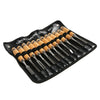 A black set of twelve professional wood carving chisels with wooden handles laid out on a dark surface.