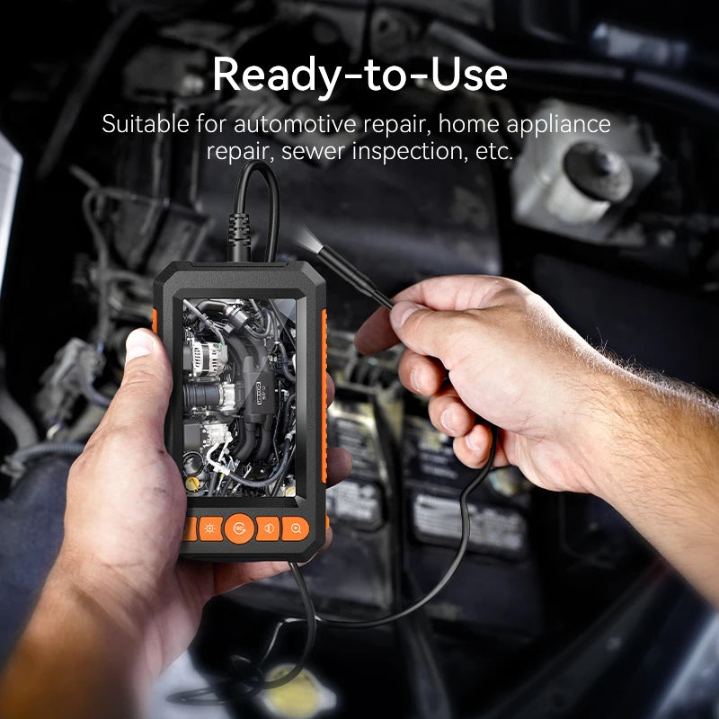 A hand holds an orange and black borescope inspection camera, ready for automotive or home appliance repair.