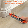 Handheld orange and black precision contour gauge used to adjust scribe distance on a wall surface.