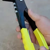 A hand holds a black and yellow heavy duty pop rivet gun kit for metal repair.