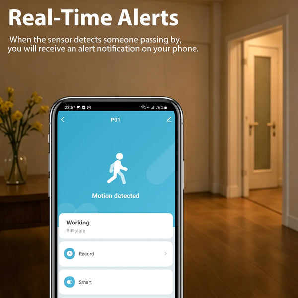A smartphone screen showing a motion detection alert with the text Motion detected and options to Record or Smart.