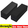 A stack of black heavy duty self-adhesive Velcro tape in a rectangular shape.