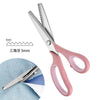 A pair of pink and silver professional stainless steel sewing shears with a 5mm opening shown next to a fabric swatch.