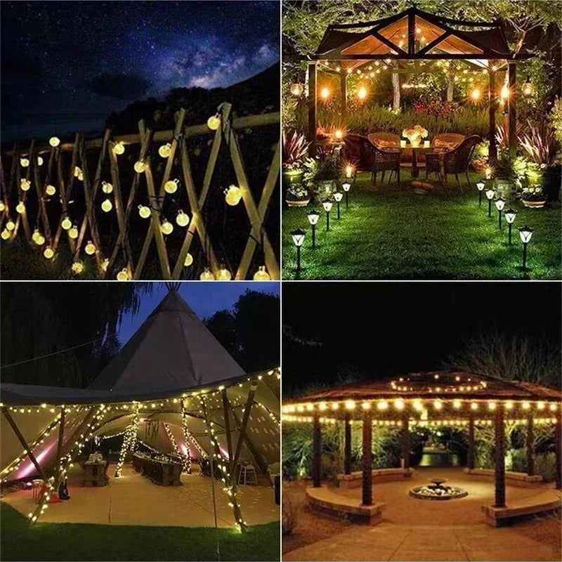 Outdoor event lighting featuring warm fairy lights strung across a garden and dining area.