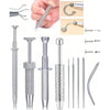 Stainless steel piercing ball grabber kit showing various tools and components for piercing