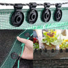 Black heavy-duty clips used to secure shade cloth or fabric onto netting and other materials.